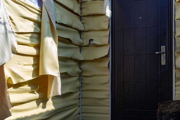 Melted Siding Replacement in Greeley